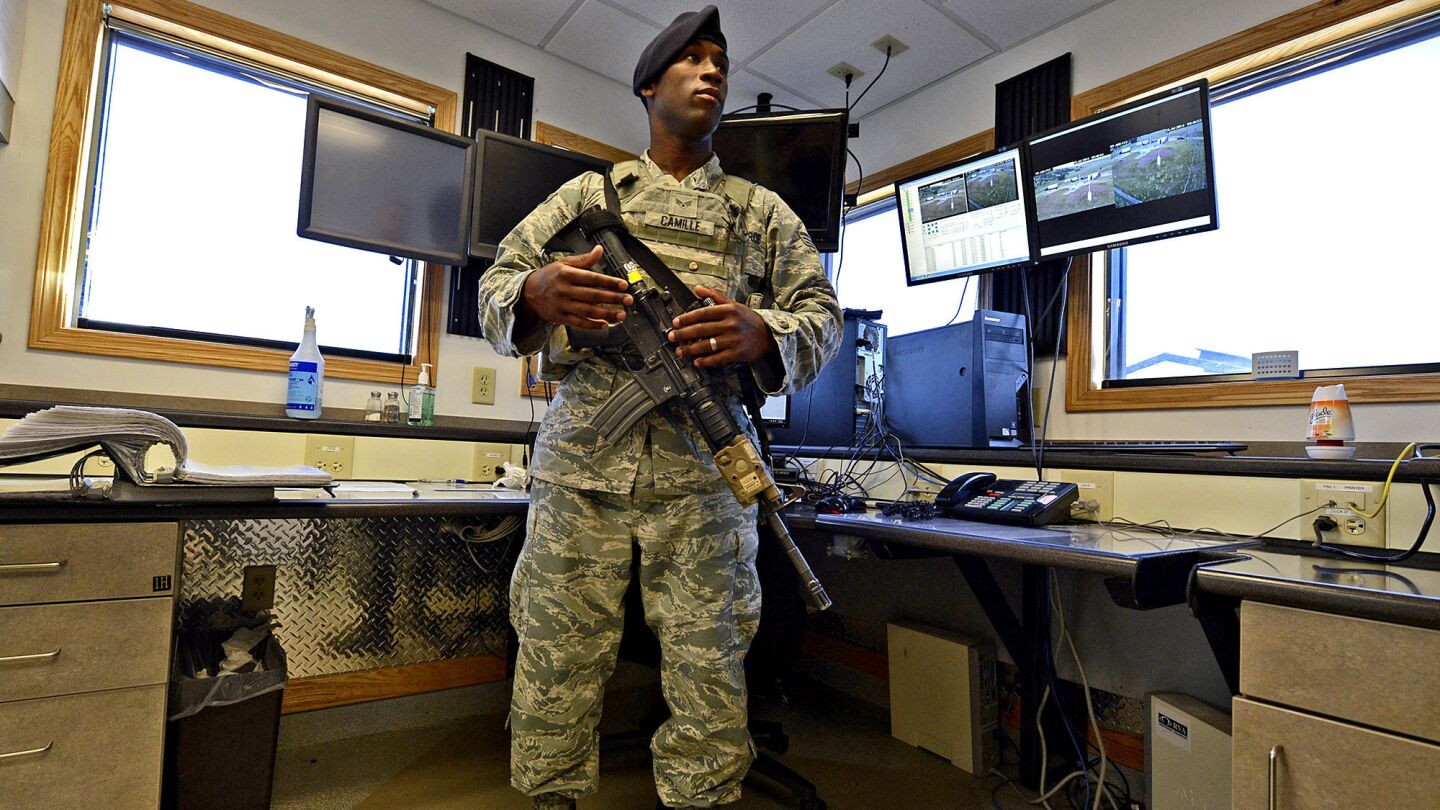 Senior Airman Israel Camille oversees security at a missile launch facility at Malmstrom Air Force Base.