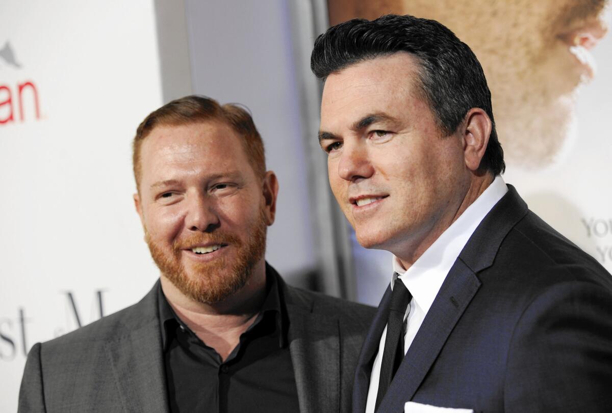 Ryan Kavanaugh, left, founder and CEO of Relativity Media, attends the premiere last year of “The Best of Me” with company President Tucker Tooley.