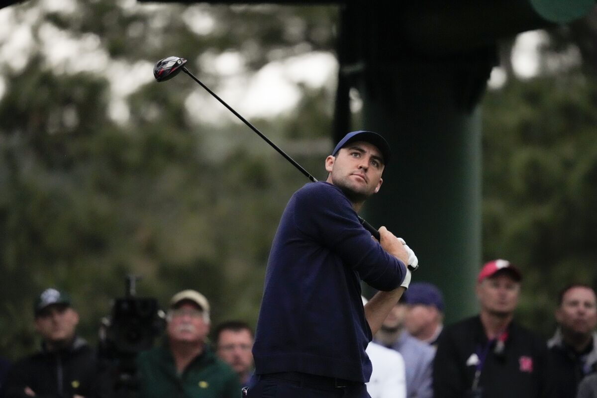 Scottie Scheffler hits off the 18th tee during the second round of the Masters on Friday.