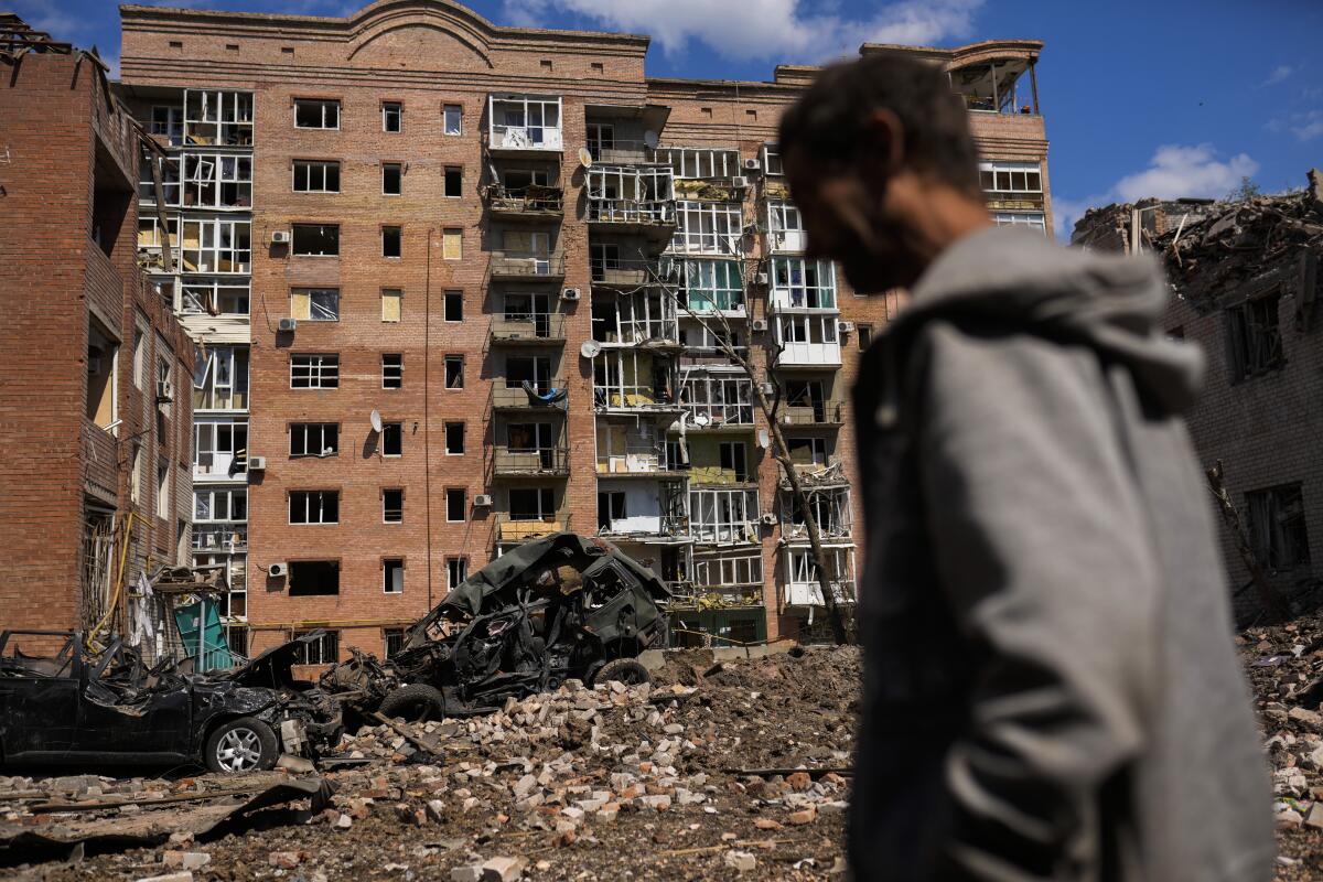 Damaged buildings and destroyed cars in eastern Ukraine