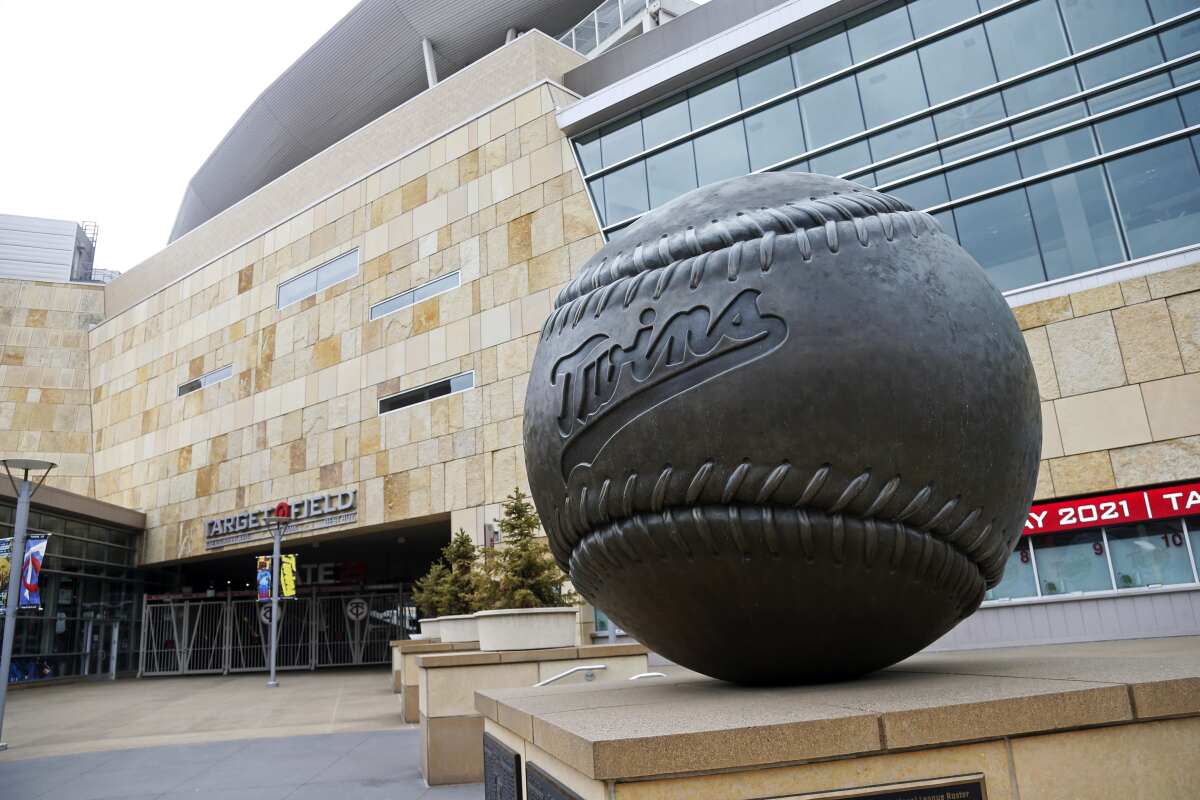 A giant baseball sculpture sits outside Target Field, home of the Minnesota Twins baseball team