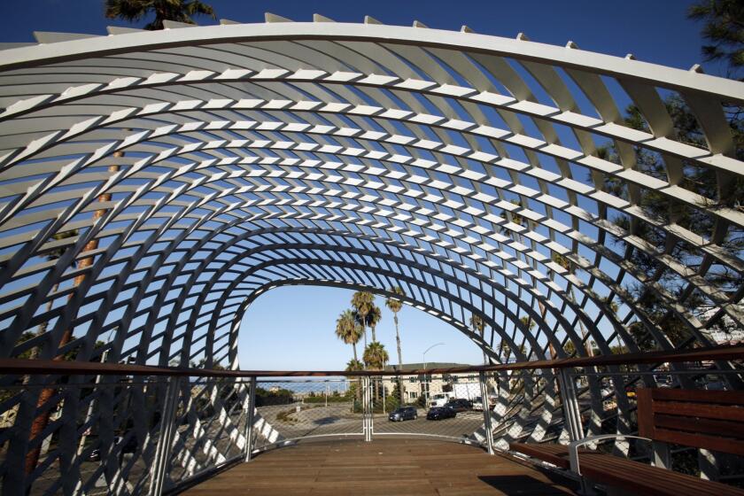 A sculptural form, resembling both curling wave and woven basket, envelops a viewing platform in Santa Monica's new Tongva Park, across Main Street from City Hall and near the coming terminus of the Expo Line.