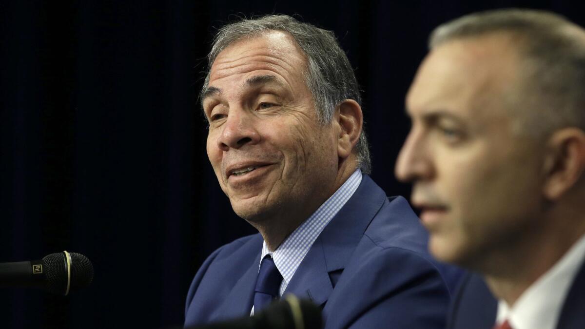 New England Revolution coach Bruce Arena, left, and team president Brian Bilello at an introductory news conference May 16.