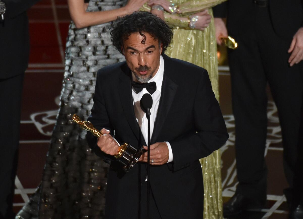 Alejandro G. Iñárritu accepts the best picture award for "Birdman.