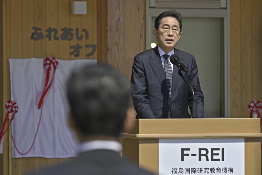 Japan's Prime Minister Fumio Kishida delivers a speech during an opening ceremony of Fukushima Institute for Research, Education and Innovation (F-REI) in Namie, Fukushima prefecture, Japan Saturday, April 1, 2023. (Kyodo News via AP)