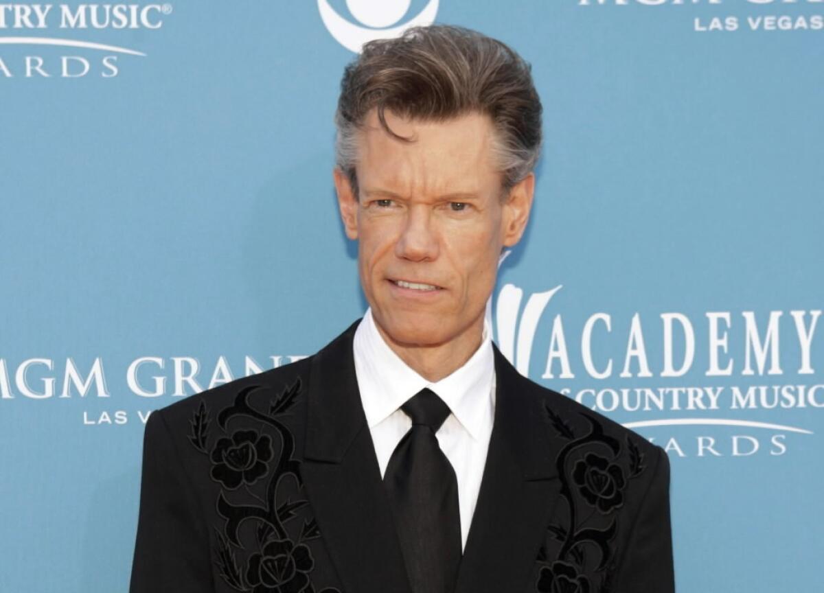 Singer Randy Travis arrives at the 45th annual Academy of Country Music Awards in Las Vegas April 18, 2010.