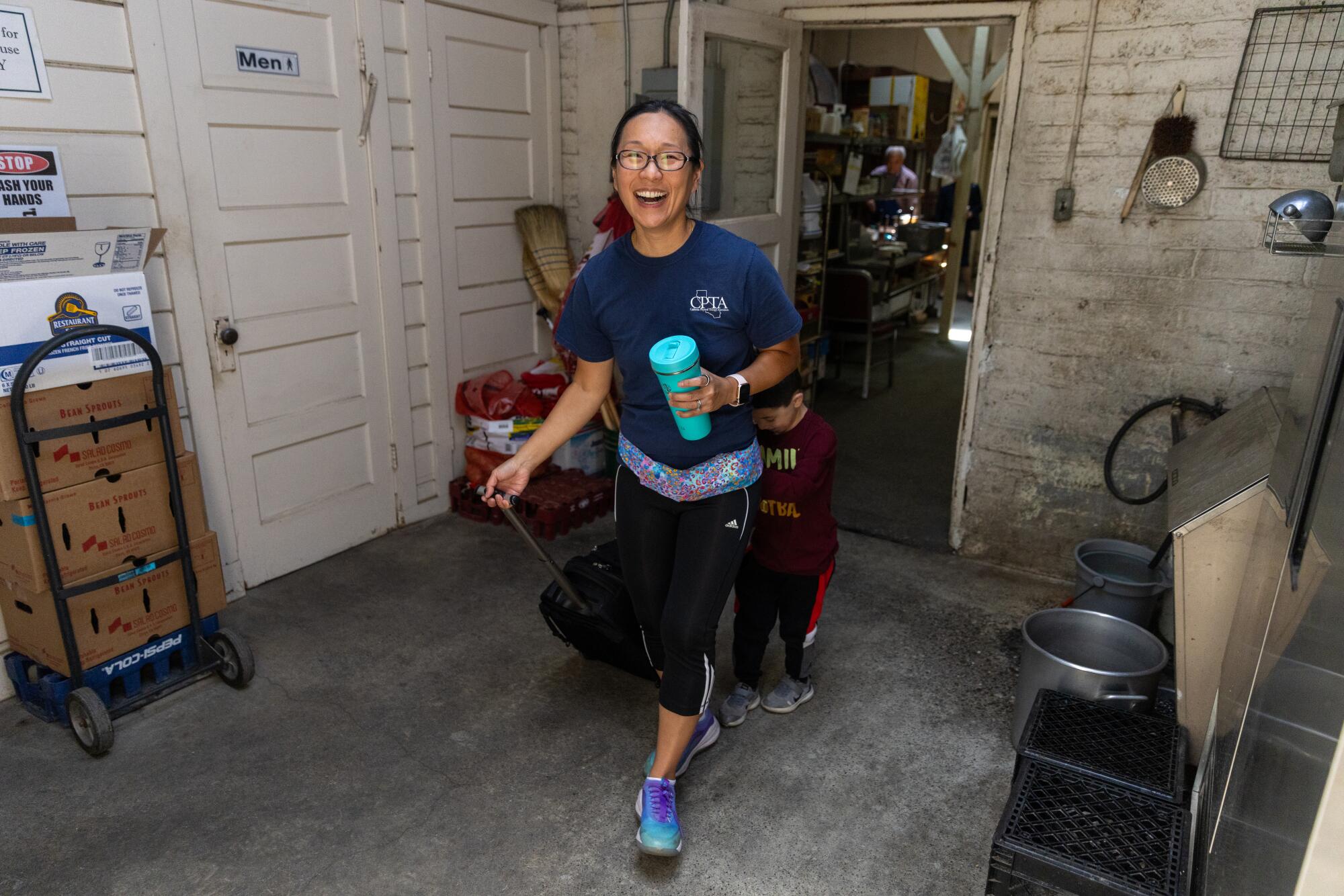 Amy Fong stops by her parents' restaurant.