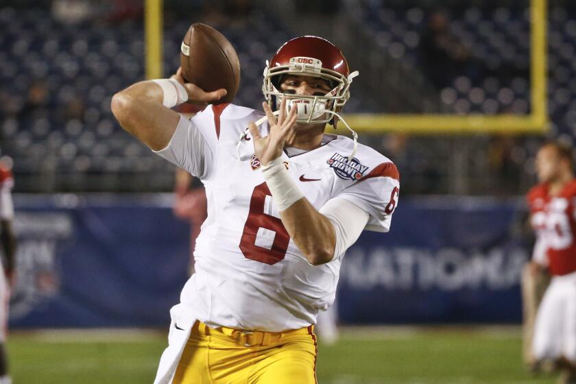 USC quarterback Cody Kessler warms up for the Holiday Bowl against Wisconsin on Dec. 30.