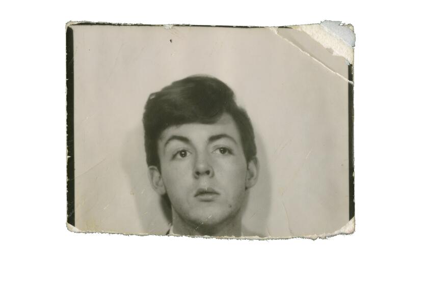 **ONE TIME USE ONLY FOR USE WITH BOOKS STORY RUNNING 12/22/21: A never before seen passport style photograph of Paul from the late 1950s from the book "The Lyrics: 1956 to the Present" by Paul McCartney and Paul Muldoon. CREDIT: © MPL Communications Ltd.