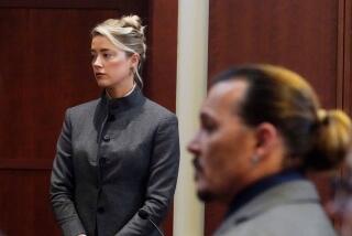 Actor Johnny Depp walks into the courtroom after a break at the Fairfax County Circuit Courthouse in Fairfax, Virginia, on May 16, 2022. - Actor Johnny Depp sued his ex-wife Amber Heard for libel in Fairfax County Circuit Court after she wrote an op-ed piece in The Washington Post in 2018 referring to herself as a "public figure representing domestic abuse." (Photo by Steve Helber / POOL / AFP) (Photo by STEVE HELBER/POOL/AFP via Getty Images)