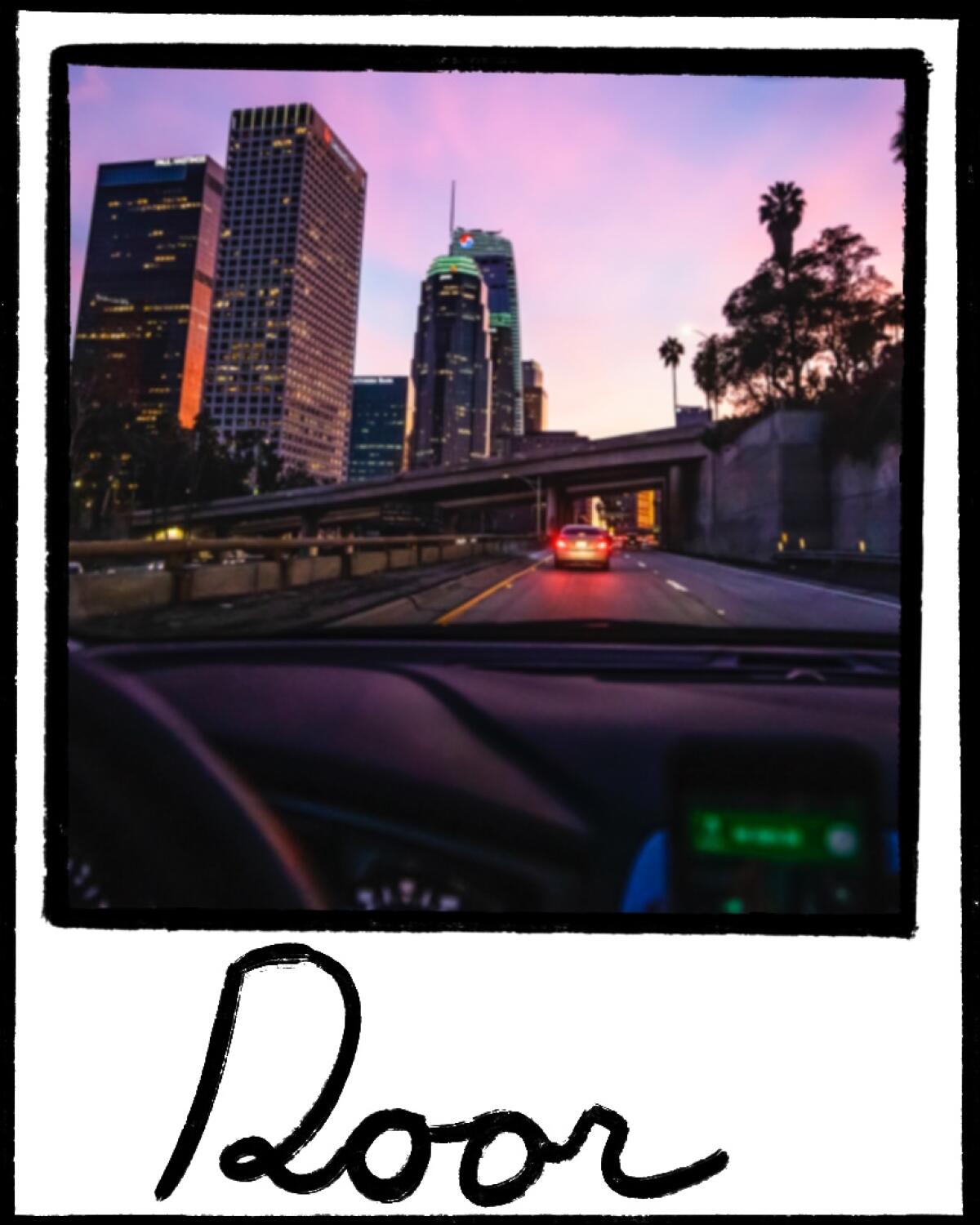 A view from behind the wheel of a car looking toward a city, with an illustrated polaroid shape around the photo