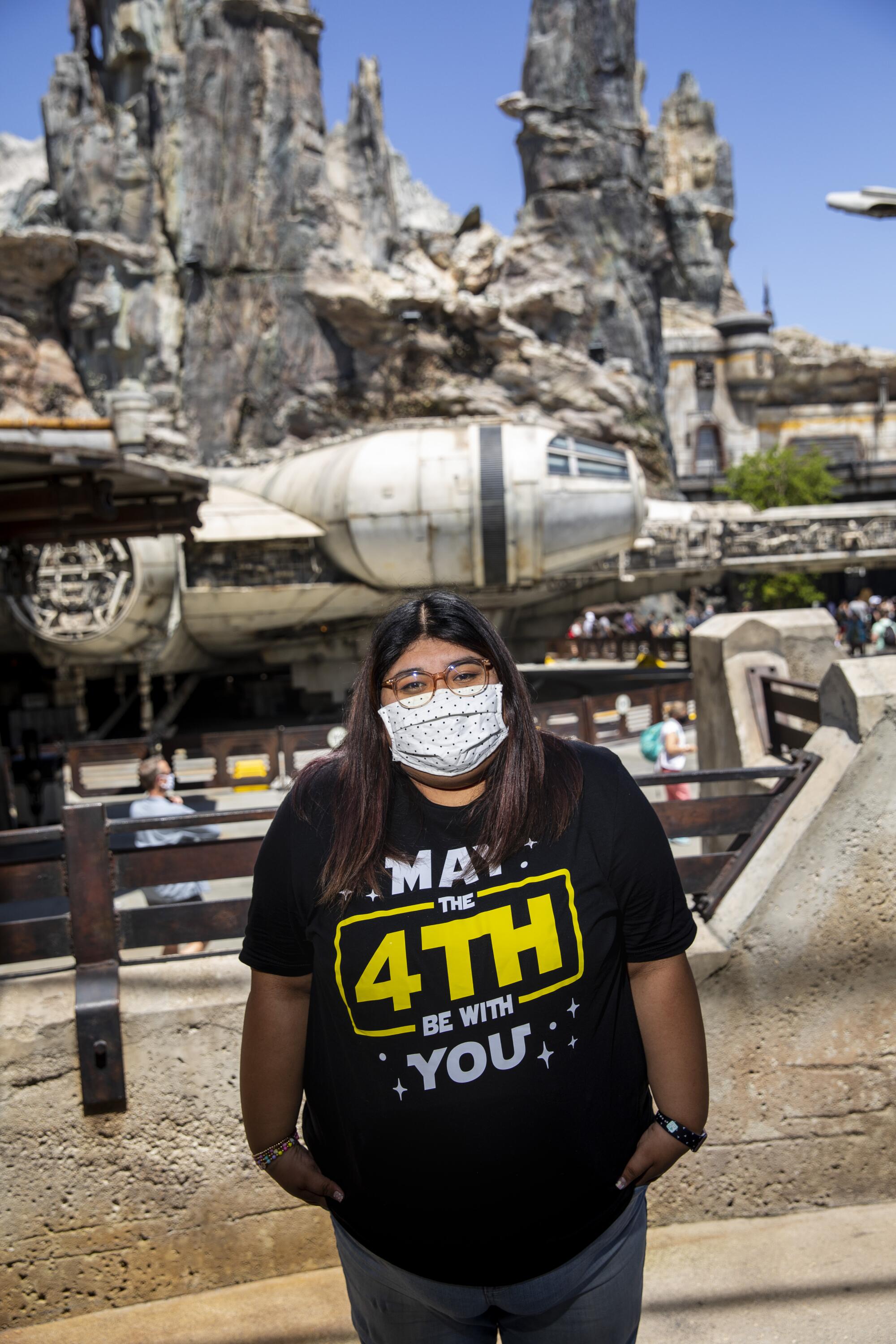 Evelyn Reyes wears a T-shirt with the message, "May The 4th Be With You." 