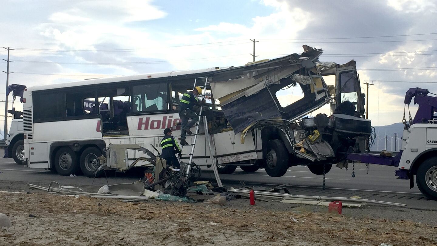 The front of the bus was crumpled and the first few rows of seats were completely crushed, a witness said.
