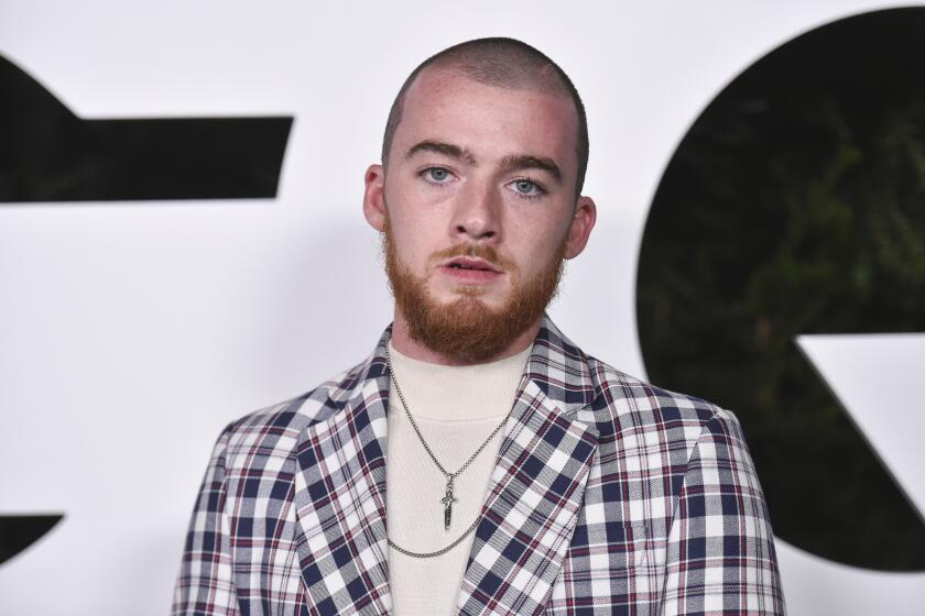 FILE - Angus Cloud attends the 2021 GQ Men of the Year Party at The West Hollywood EDITION on Thursday, Nov. 18, 2021, in West Hollywood, Calif. Cloud, the actor who starred as the drug dealer Fezco "Fez" O'Neill on the HBO series "Euphoria," has died. He was 25. Cloud's publicist, Cait Bailey, said McCloud died Monday at his family home in Oakland, California. No cause of death was given. (Photo by Richard Shotwell/Invision/AP, File)