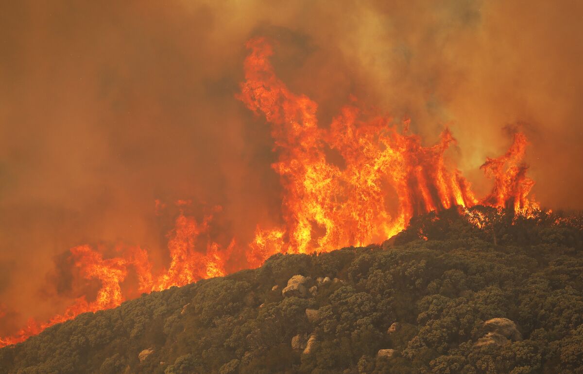 Flames erupt above Santa Barbara.
