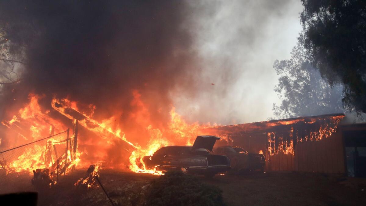 A home burns during the Creek Fire in the Lake View Terrace area of Los Angeles in December.