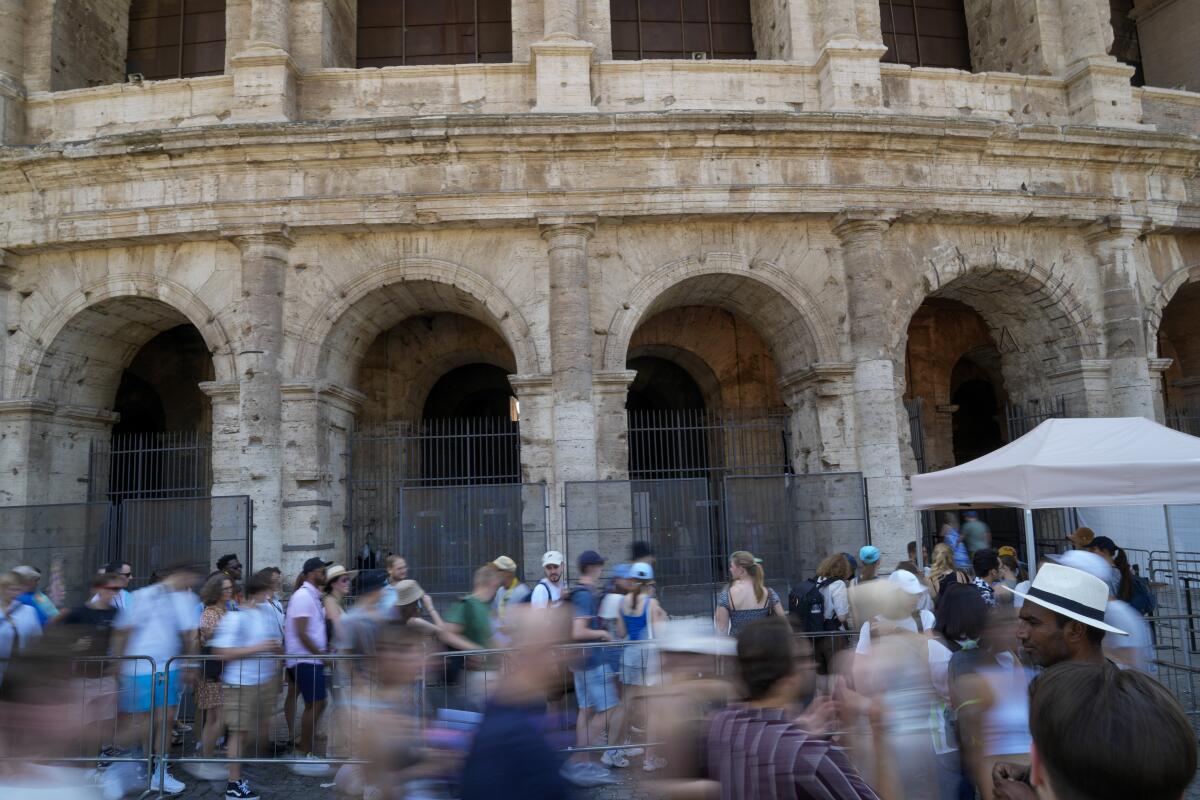 Visitors at the Colosseum in Rome