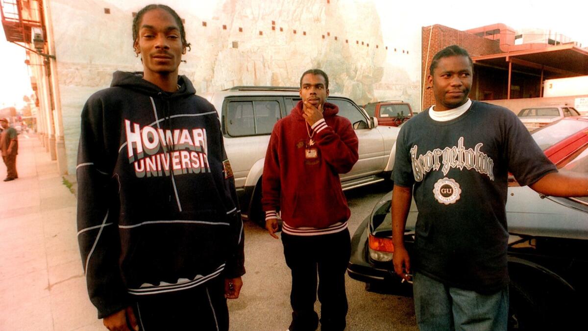 Snoop Dogg, far left, poses for the Los Angeles Times in 1993.