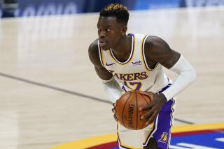 Lakers guard Dennis Schroder in action against the Nuggets.