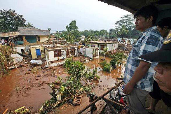 Dam burst near Jakarta kills 52