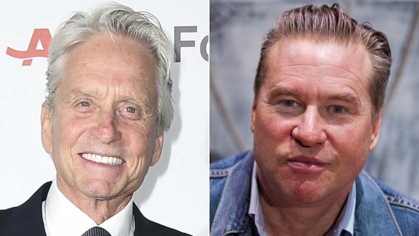 Michael Douglas, left, was "misinformed" about Val Kilmer's health, the "Top Gun" actor says.