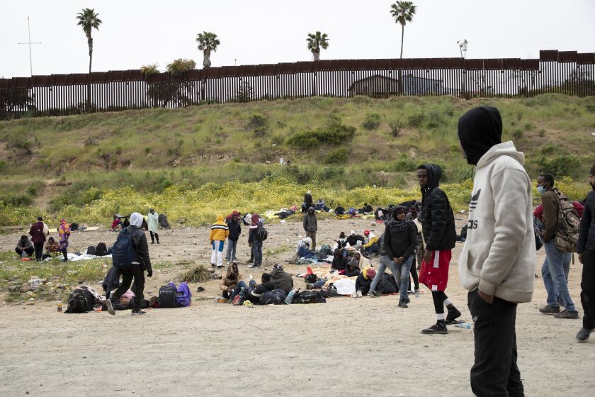 San Diego , California - April 12: More than a hundred asylum seekers from various countries had been apprehended by Border Patrol and said some had been stuck in-between the U.S.-Mexico border walls for as long as seven days on Wednesday, April 12, 2023 in San Diego , California. They said that agents gave them no food and minimal water while they were held in custody there. (Ana Ramirez / The San Diego Union-Tribune)