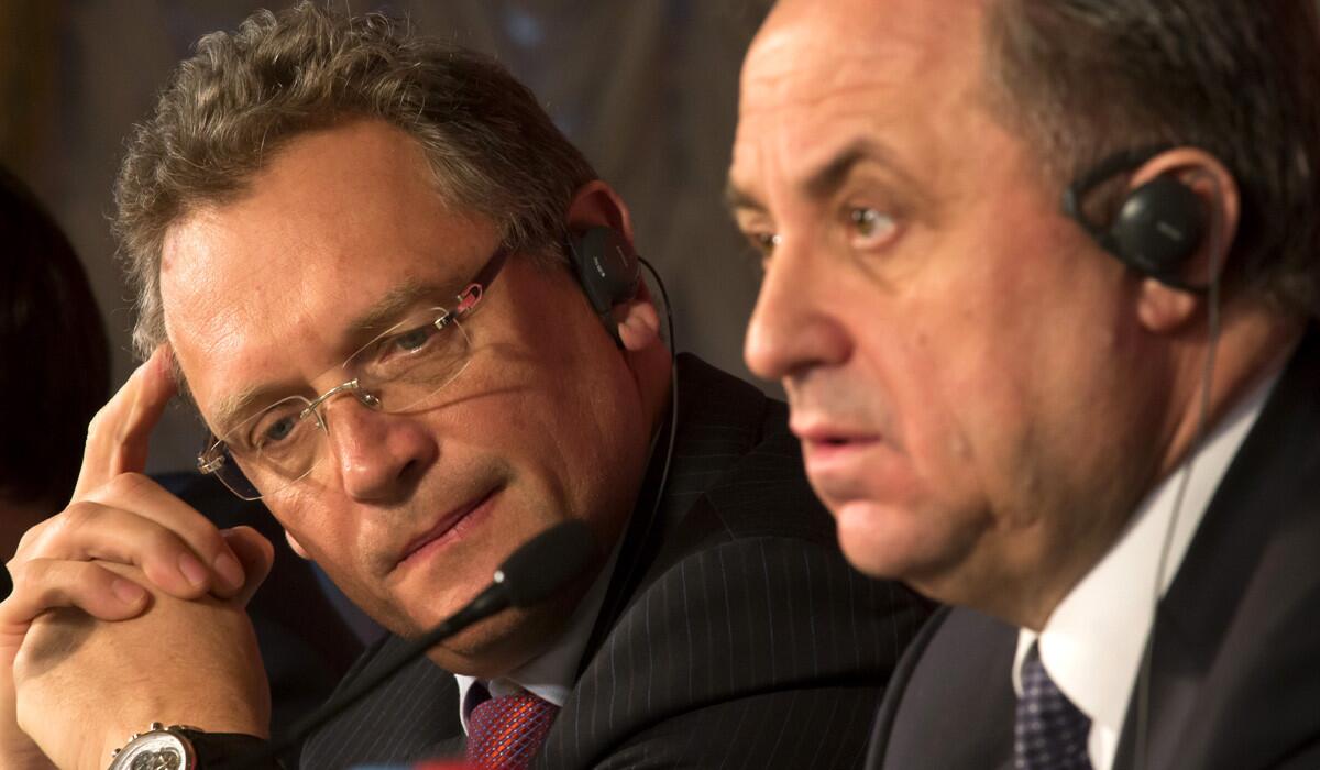 FIFA Secretary General Jerome Valcke, left, and Russian Sports Minister Vitaly Mutko attend a news conference in St. Petersburg, Russia on Feb. 16. The New York Times reported on Monday that the high-ranking FIFA official who allegedly made a $10-million payment central to a U.S. probe into soccer corruption is believed to be Sepp Blatter's right-hand man, Valcke.