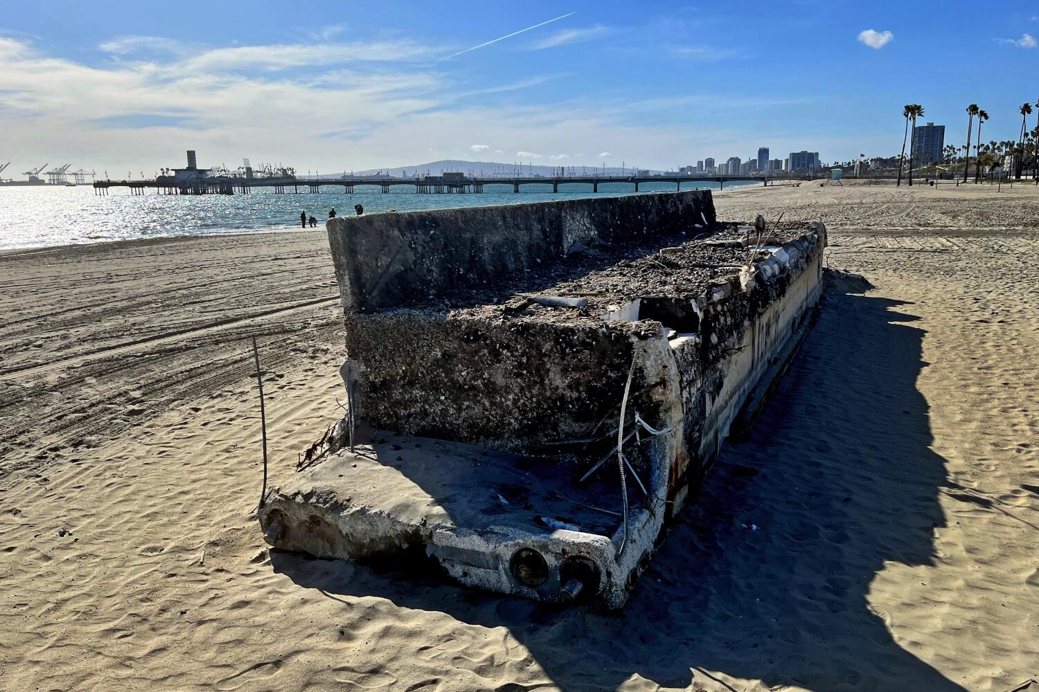 A bus-sized piece of concrete on the beach: A tale of waste, neglect and climate change
