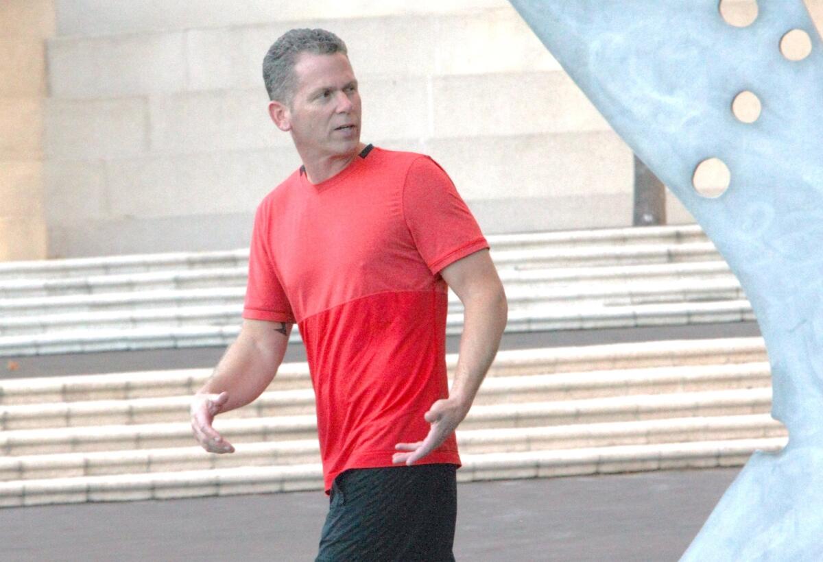 Burbank Police officer Anthony Valento leaves the Roybal Federal building in Los Angeles on October 16, 2013. He pleaded not guilty Tuesday to charges that he solicited money in exchange for attempting to sway prosecutors in a criminal case.