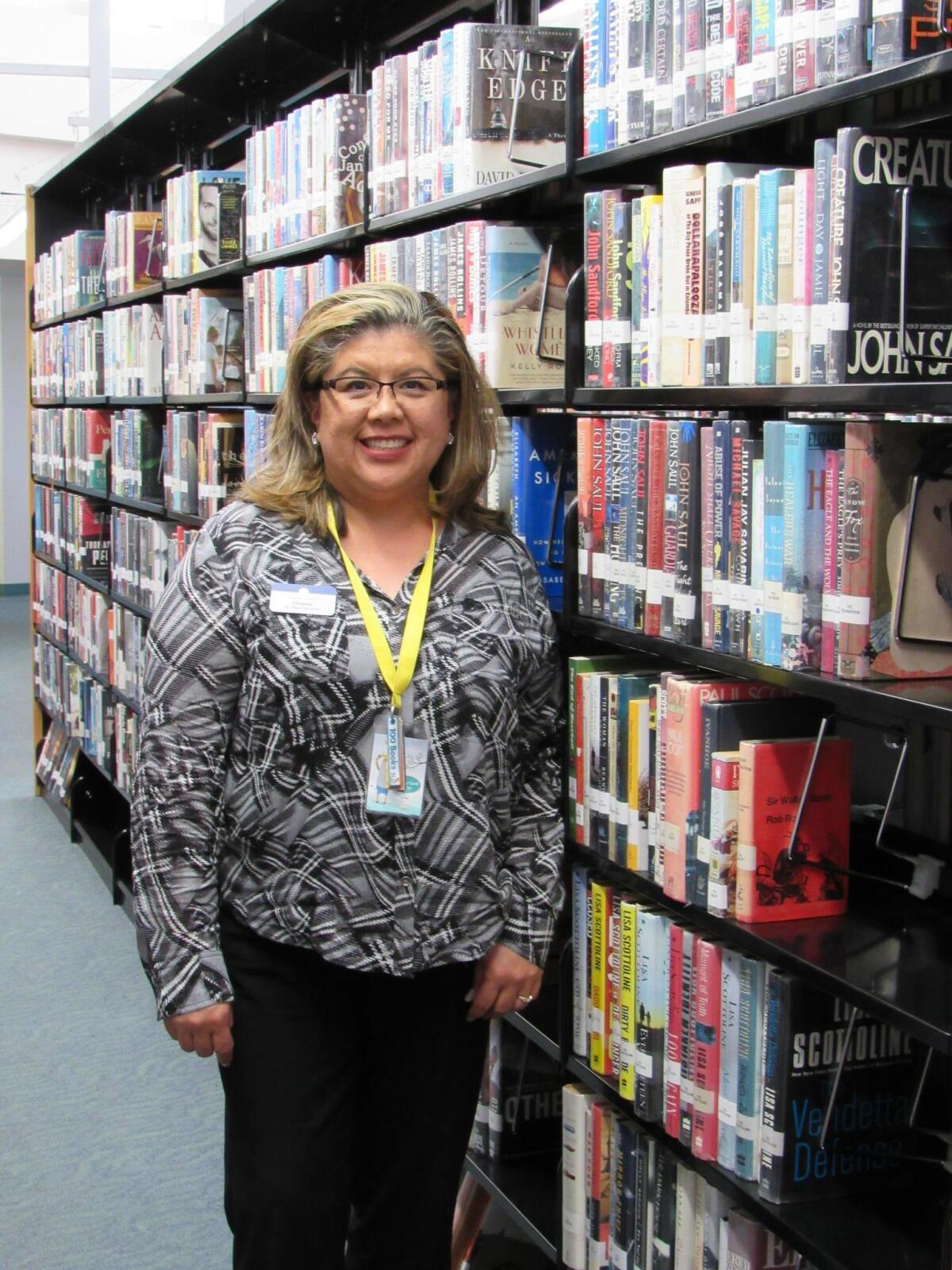 Branch Manager Christine Gonzalez is pictured in 2018 at the Point Loma/Hervey Library.