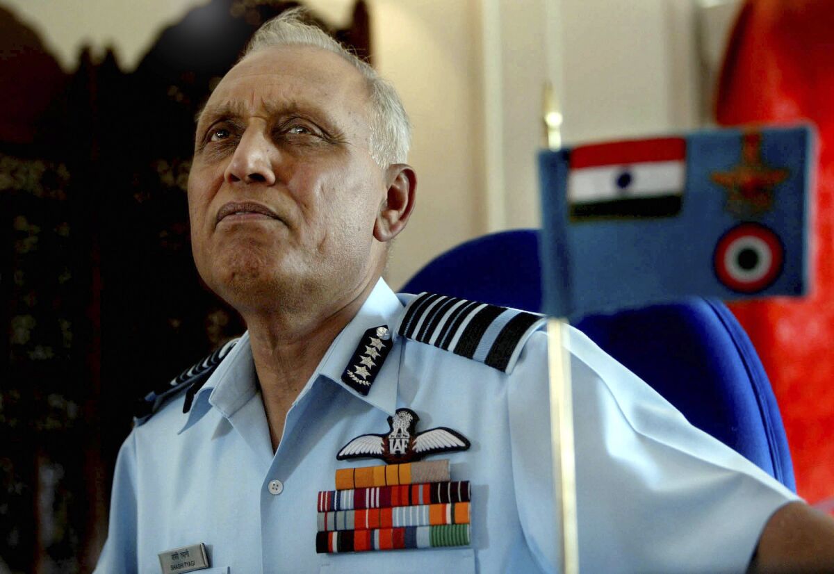 Former Indian air force chief Shashindra Tyagi listens to a question during a 2005 press conference at a military air base on the outskirts of Srinagar, India. On Wednesday, Tyagi denied involvement in an alleged kickback scheme involving payments from the Italian group Finmeccanica to facilitate a multimillion-dollar helicopter deal.