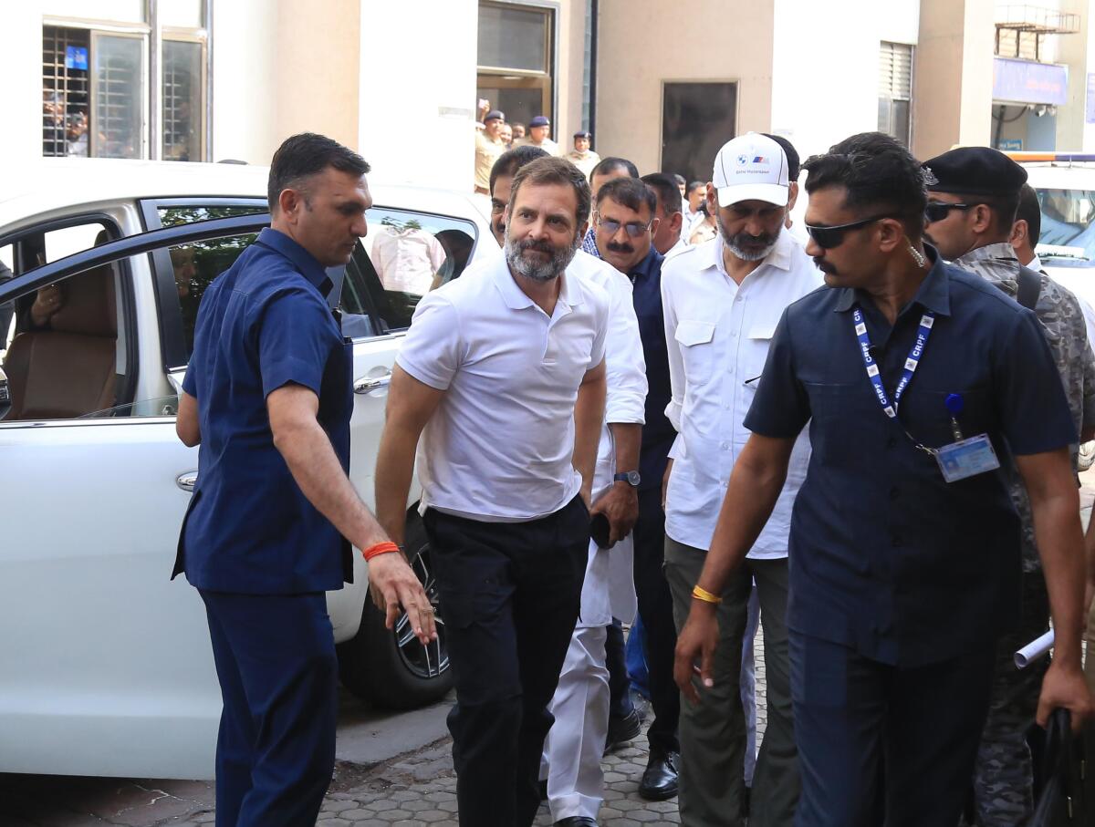 Indian opposition leader Rahul Gandhi arriving at a courthouse in Surat, India