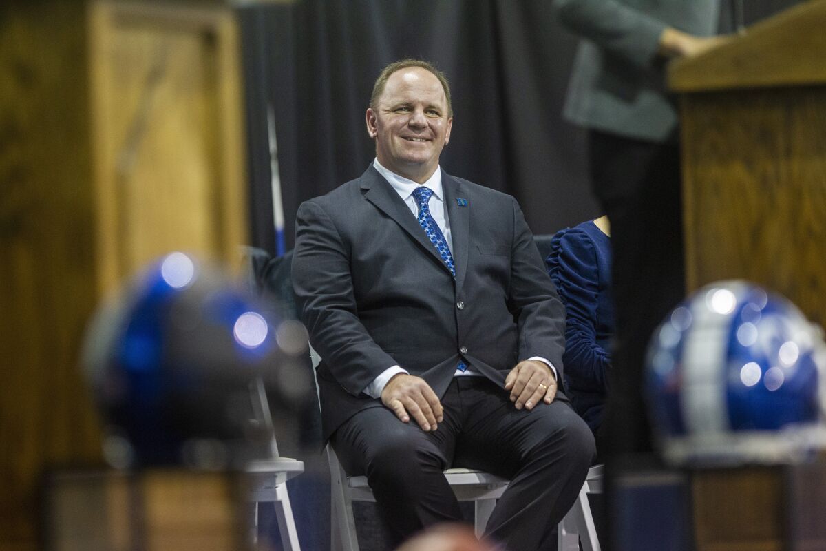 Mike Elko waits to be introduced as Duke University's head football coach during a news conference at Pascal Field House in Durham, N.C. Monday, Dec. 13, 2021. (Travis Long/The News & Observer via AP)