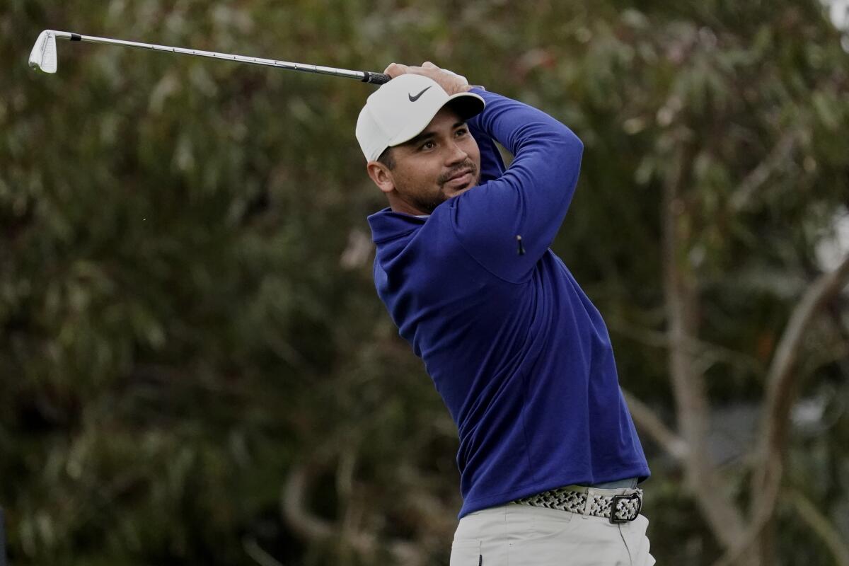 Jason Day of Australia, watches his tee shot on the 10th hole during the first round of the PGA Championship.