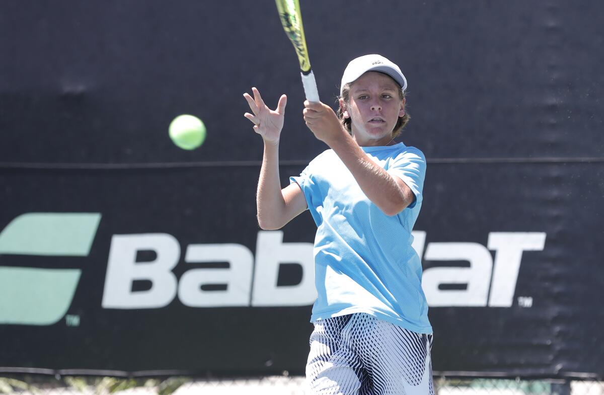 Perry Di Giulio hits a forehand during practice at the Advantage Tennis Academy, which reopened at RCI recently.