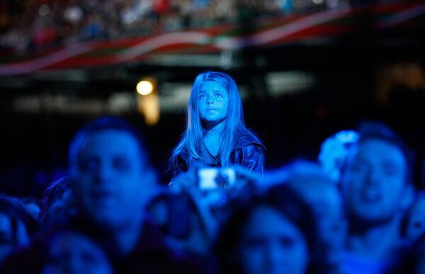 A young girl watches the 'Michael Forever' tribute concert.