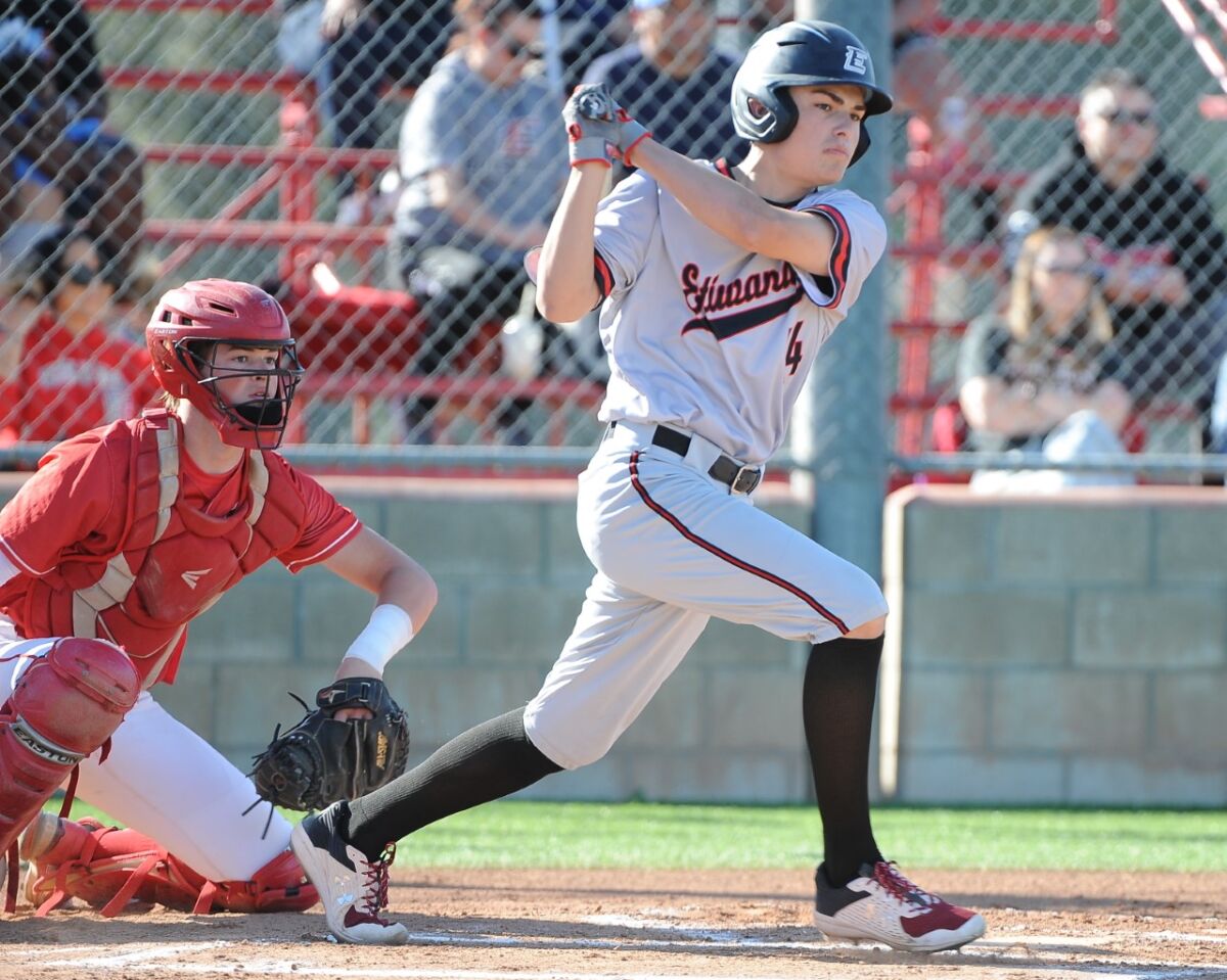 Etiwanda freshman Brady Ebel swinging at a pitch.