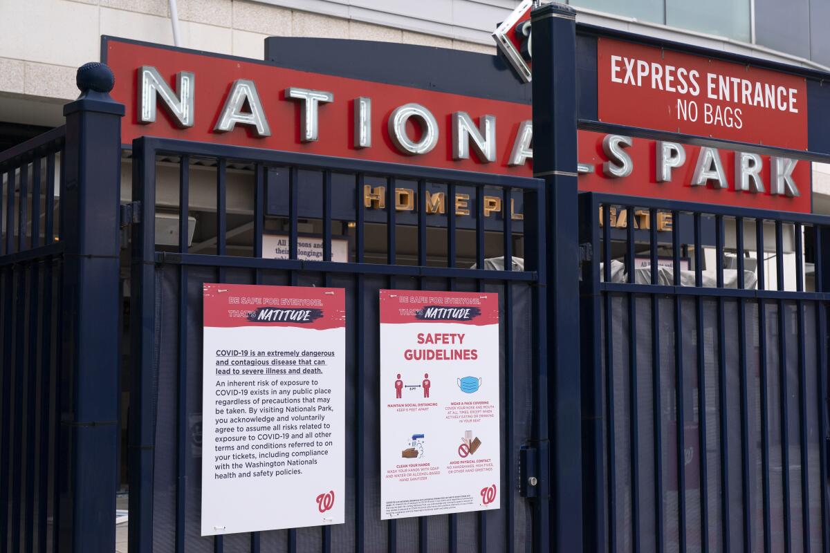 Nationals Park is closed after the opening day baseball game between the Washington Nationals and New York Mets was postponed because of coronavirus concerns. Thursday, April 1, 2021, in Washington. (AP Photo/Jacquelyn Martin)