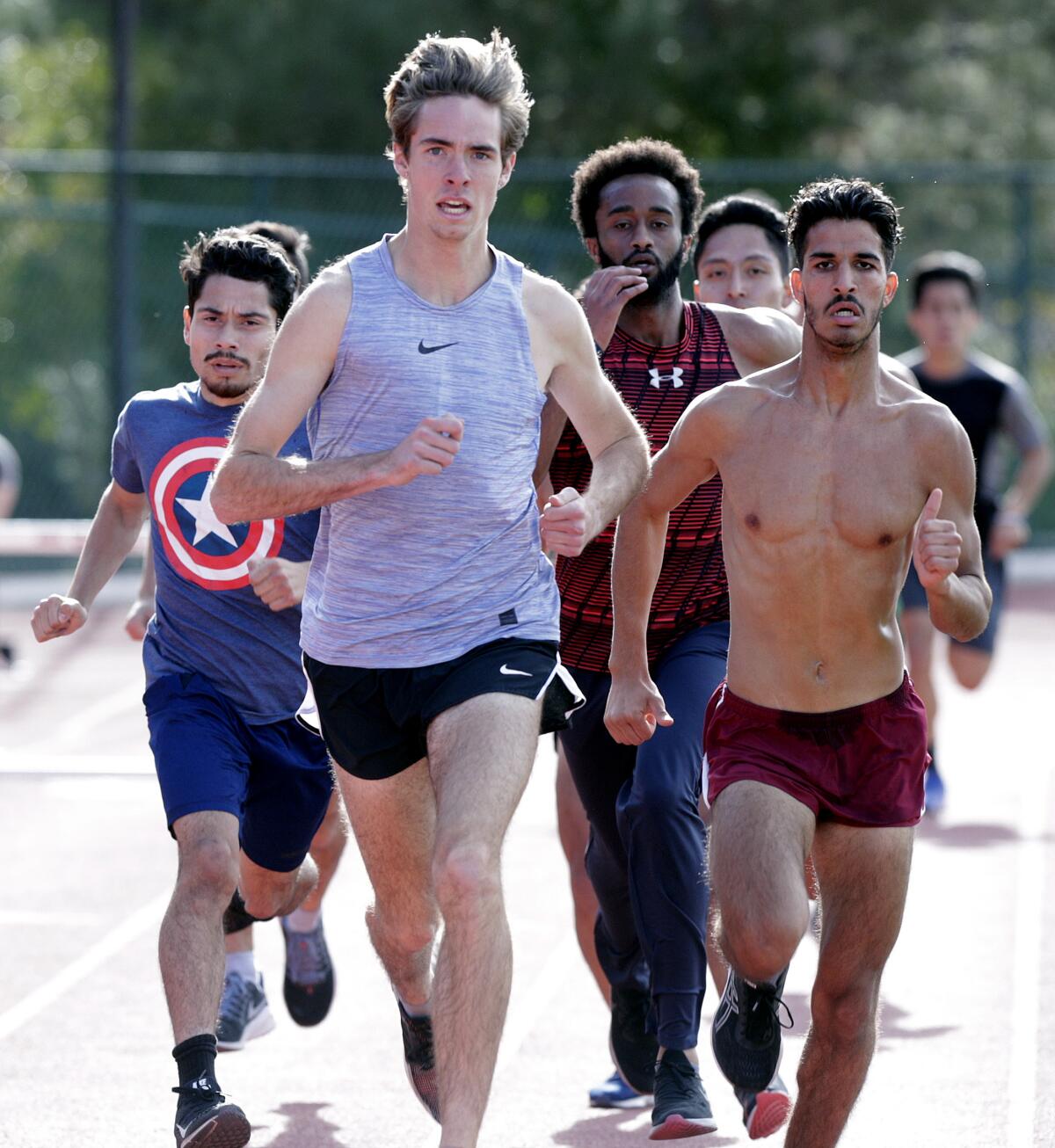 GCC's Spencer Geck, a Crescenta Valley High School graduate, runs laps with teammates at track practice at Glendale Community College on Tuesday, January 29, 2020.
