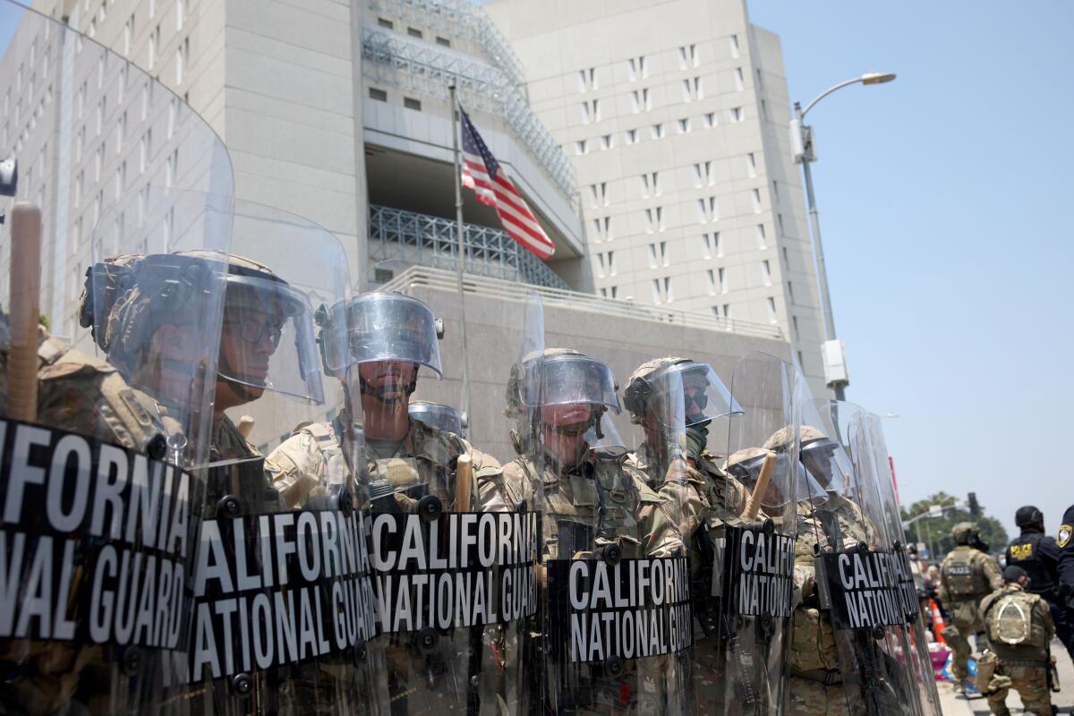 National Guard troops are stationed at the Metropolitan Detention Center