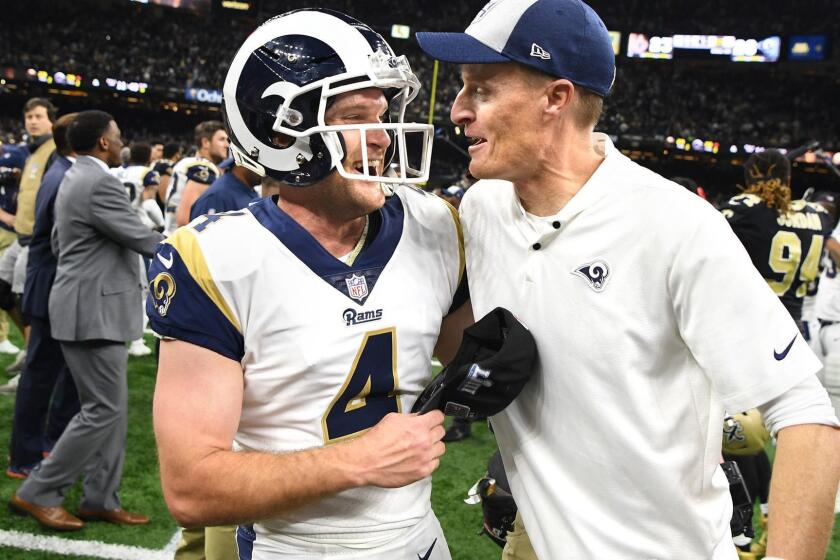 NEW ORLEANS. LOUISIANA JANUARY 20, 2018-Rams kicker Greg Zuerlein celebrates his game-winning filed goal with special teams coach John Fassel in the NFC Championship at the Superdome in New Orleans Sunday. (Wally Skalij/Los Angeles Times)