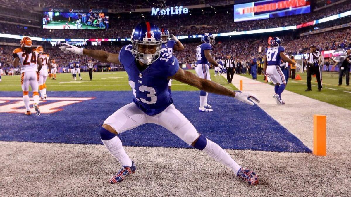 Giants receiver Odell Beckham Jr. strikes a pose after scoring a touchdown against the Bengals during a game on Nov. 14.