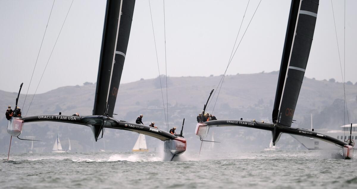 Oracle Team USA practices with both of its AC72 catamarans before the Louis Vuitton Cup Finals in August. The AC72s are built for speed and power.