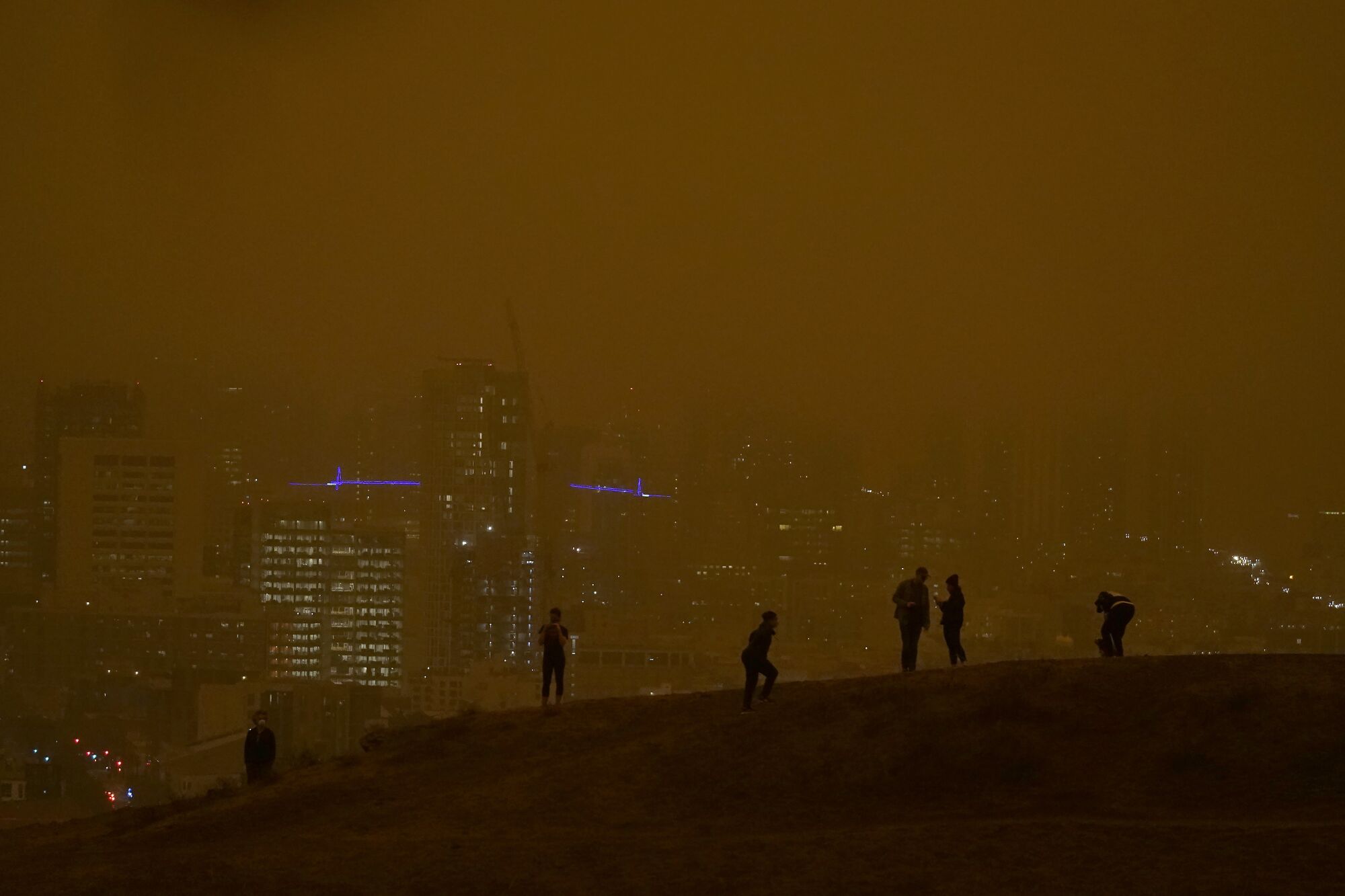 Downtown San Francisco is difficult to make out from Kite Hill Open Space on Wednesday morning.