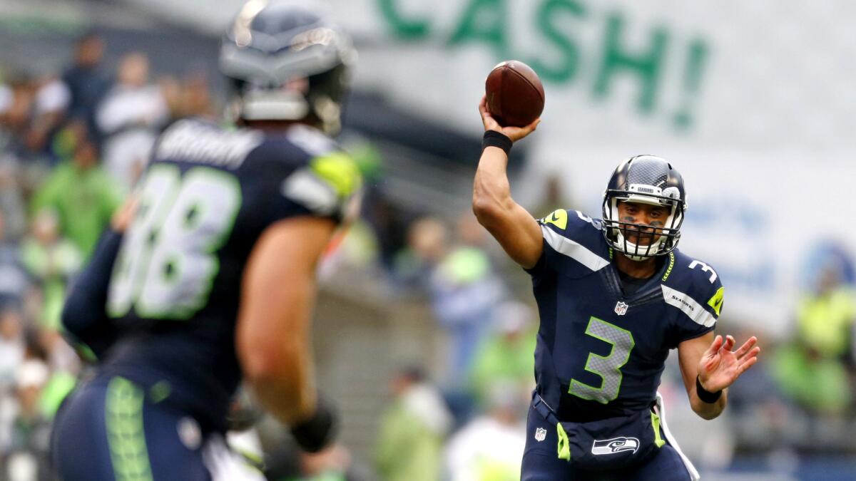 Seahawks quarterback Russell Wilson (3) now has All-Pro tight end Jimmy Graham to target in the passing game.
