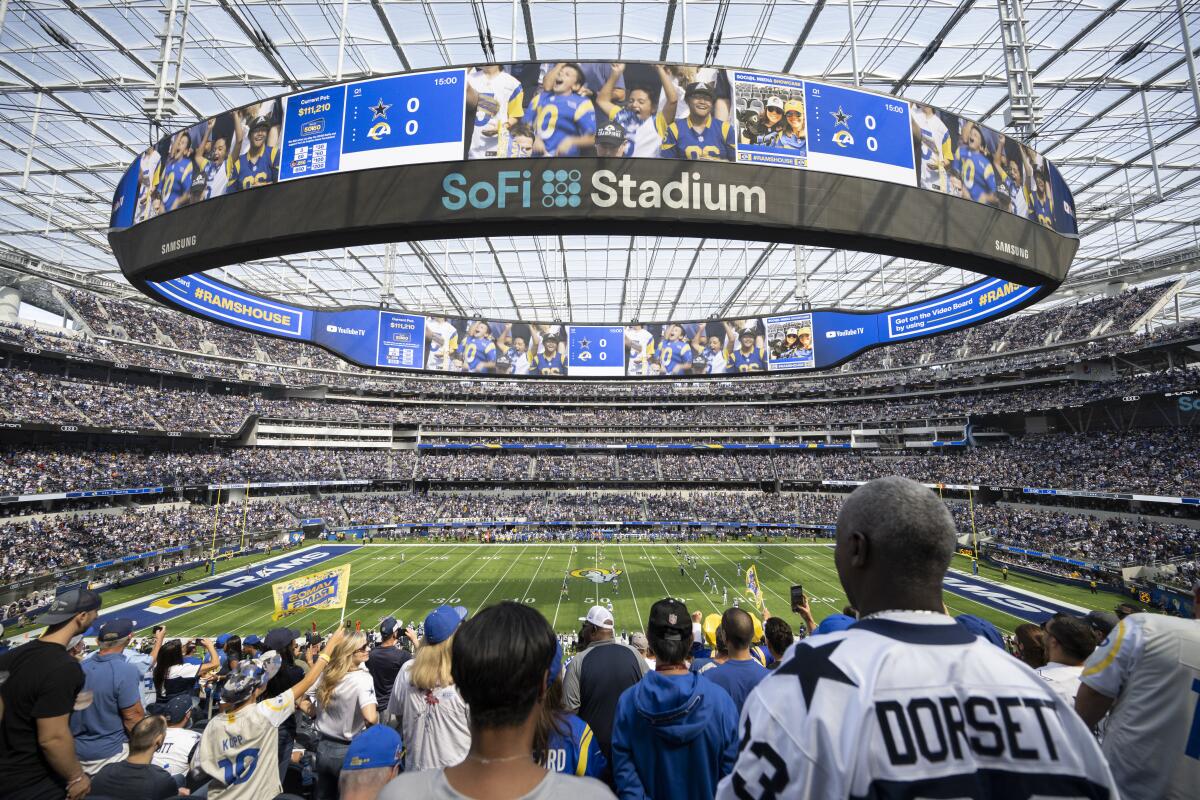Fans watch Sunday's game between the Rams and Dallas Cowboys at SoFi Stadium.
