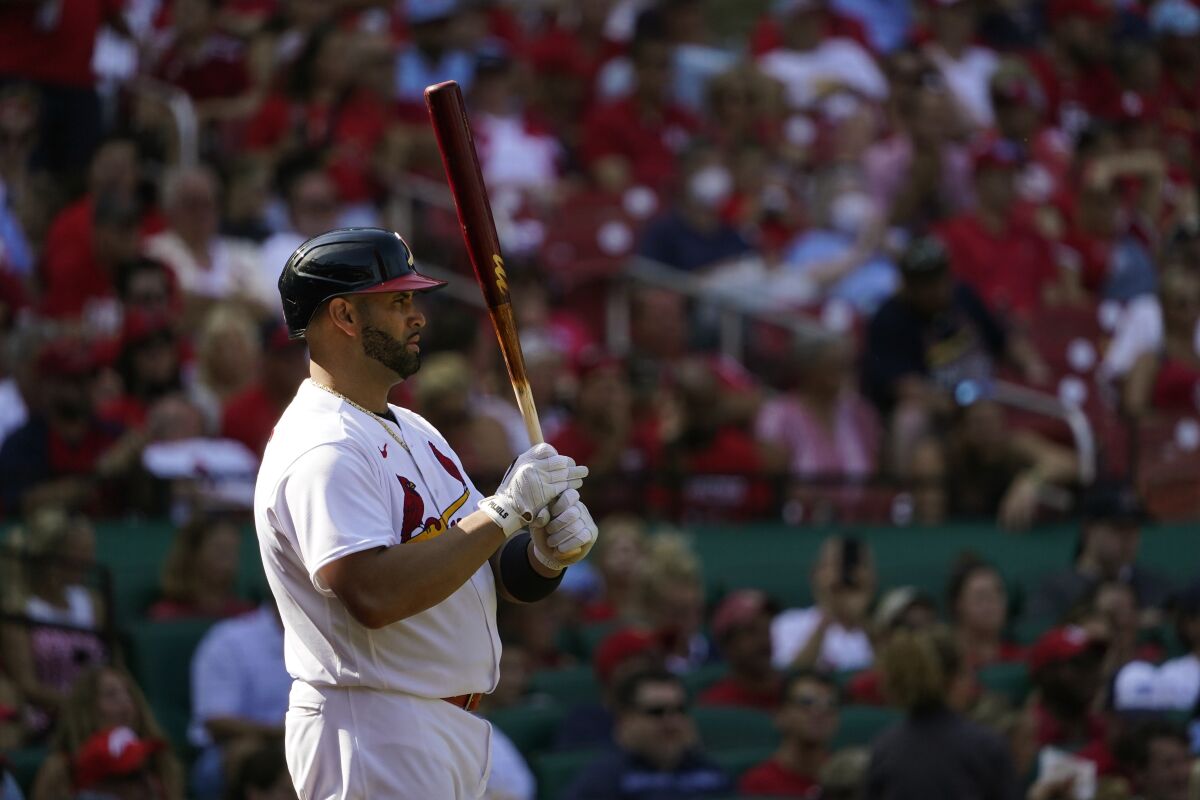 St. Louis Cardinals' Albert Pujols stands in the on-deck circle as he waits to bat.