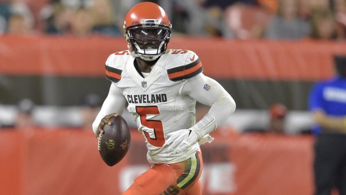Browns quarterback Tyrod Taylor rolls out of the pocket in search of a receiver during a game against the Eagles on Thursday night.