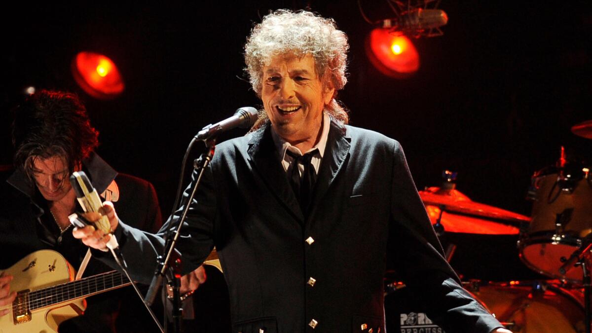 Bob Dylan performs in Los Angeles on Jan. 12, 2012. Dylan was named the winner of the 2016 Nobel Prize in literature on Thursday, marking the first time the prestigious award has been bestowed upon someone seen primarily as a musician.