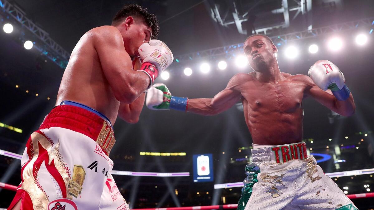 Errol Spence Jr. fights Mikey Garcia in an IBF World Welterweight Championship bout at AT&T Stadium on March 16, 2019 in Arlington, Texas.